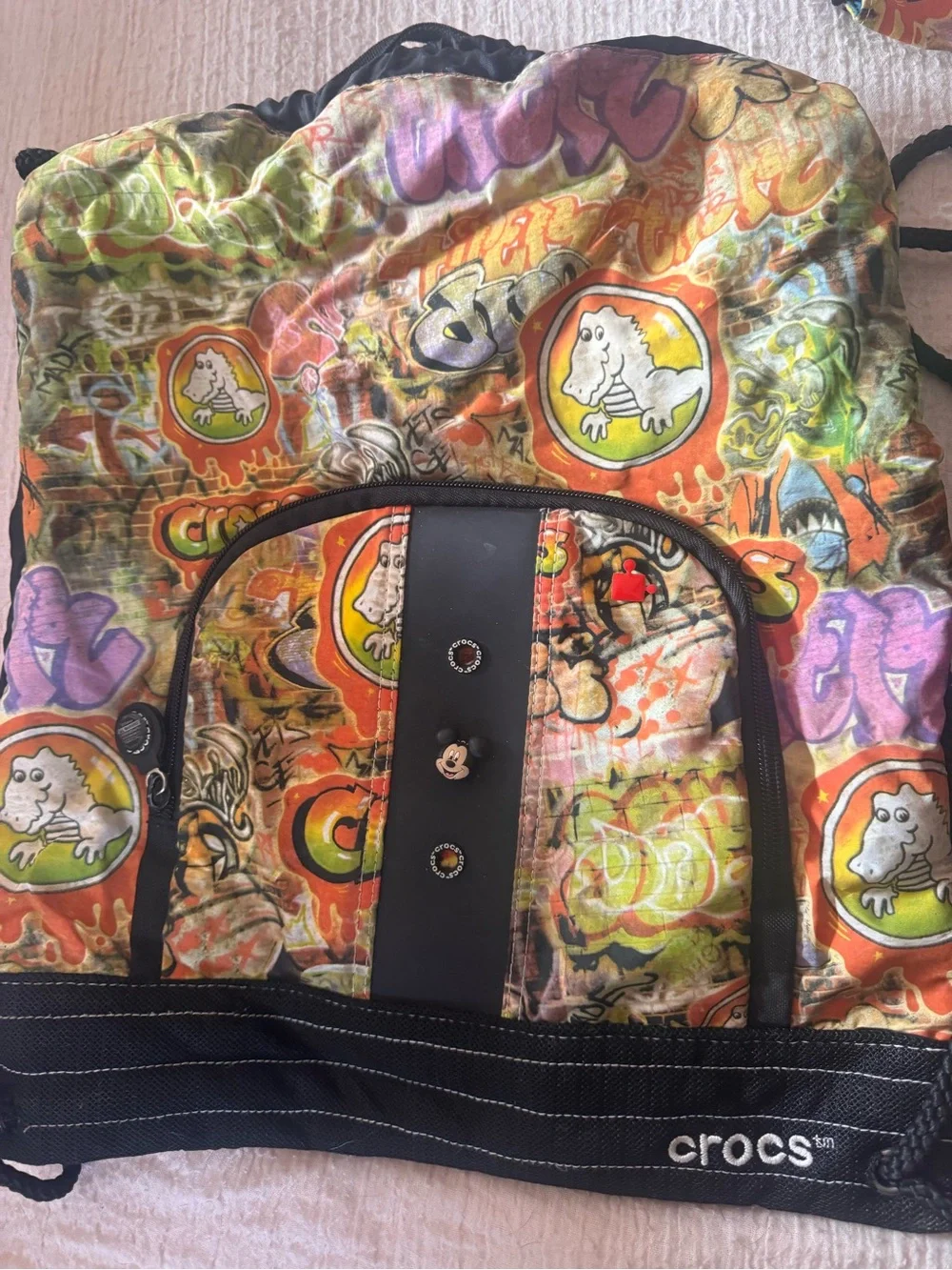 (2) CROCS Graffiti Backpack in Orange, Green, Yellow, Purple